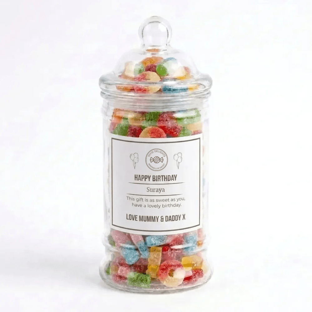 A Victorian-style jar filled with colourful pick & mix, with a personalised happy birthday label for Suraya